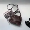 Bolso de Mano Pequeño Nuevo para Viajes Cotidianos Retro Bolso Boston de Bolos para Mujer Sensación de Alta Gama Lujo Ligero Bolso Pequeño de Hombro Cruzado