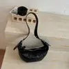 Bolsa Transversal de Nicho Transfronteiriça Formato de Chifre para Mulheres 2026 Nova Moda Primavera/Verão Retrô Versátil Ombro Axila Bolsa Bolinho