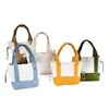Bolsa de lona mini personalizada transfronteriza para guardar audífonos, llaves y labial, monedero mini colorido de patchwork