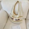 Bolso de Mano Tejido Simple Estilo Coreano Literario para Mujer 2025 Verano Nuevo Retro Hueco con Letra Bolso de Hombro para Axila