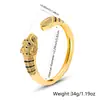 Europa y Estados Unidos venta caliente micro incrustación circón pulsera abierta tendencia nicho ojos verdes leopardo cobre joyería de mano venta caliente transfronteriza