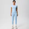 Conjunto deportivo de dos piezas para mujer, pantalones deportivos de tiro alto, ajustados, manga corta, estilo 'scrub' europeo y americano, para yoga