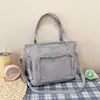 Bolso de hombro grande de moda estilo coreano y japonés para niñas, adecuado para que las estudiantes lo usen como mochila escolar o bolso de mano, con un diseño transparente y una correa de doble hombro