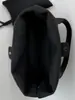 Bolsa de ombro casual retrô texturizada para o dia a dia, novo modelo de verão 2026, bolsa tote fashion de grande capacidade com tachas