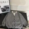 Suéter Tejido Falso de Dos Piezas para Niños 2026 Otoño Estilo Coreano Infantil Patchwork Caliente Venta Ropa Exterior Elegante Moda Tendencia