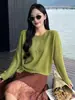Lana fina cálida hebilla cuello redondo simple generoso manga larga versátil para mujer otoño e invierno estilo perezoso temperamento prenda interior