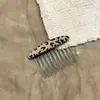Peine para el cabello de tela ovalado estilo francés con estampado de leopardo nuevo, accesorio para el cabello simple y versátil estilo coreano para peinar y arreglar cabellos sueltos
