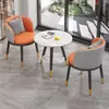 Juego de sofá de un asiento y mesa de centro para recepción de hotel, sala de reuniones de clientes, oficina de ventas, salón de belleza, centro comercial, mueble de sala de exposición, gama alta