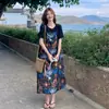 Conjunto de Dos Piezas de Moda Casual Adelgazante Simple de Manga Corta + Falda con Tirantes Estampado de Pintura al Óleo Verano 2026