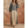 Moda femenina europea y americana otoño 2026 nueva colección: vestido de playa casual de talla grande, con bloques de color, cuello en V y mangas abullonadas, corte holgado