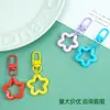 Nuevo llavero de pentagrama hueco de colores, accesorios de hebilla de puerta giratoria, materiales para accesorios de joyería hechos a mano DIY al por mayor