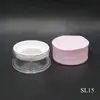 El fabricante suministra estuche redondo morado para polvo suelto 16g material de embalaje para polvo fijador plástico recipiente cosmético