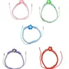 Pulsera Ajustable de Cuerda Tejida con Cuentas Redondas de Cerámica Suave Plumeria Estilo Bohemio Versátil Hawaiano Transfronterizo Europeo y Americano