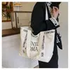 Bolsa de Lona con Letras para Mujer, Nuevo Estilo Transfronterizo de Tailandia, Bolso de Hombro de Celebridad de Internet para Dama, Bolso de Mano Tote para Viajar