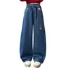 Jeans de Otoño para Niñas 2026 Nuevos Jeans Casuales Estilo Coreano para Niñas Mayores con Cinturón de Manzana, Tendencia Transfronteriza