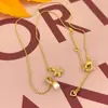 Estilo casual europeo y americano dulce collar de perlas de agua dulce con estrella de mar lindo doble colgante con microincrustaciones de circón cadena para la clavícula llamativa femenina