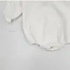 2026 Otoño Nuevo Estilo Coreano Bloque de Color Cuello Peter Pan Manga Larga Mameluco Mameluco Burbuja Manga Larga para Bebé
