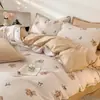 Nuevo modelo primavera y verano todo algodón estampado gofrado simple juego de casa de cuatro piezas dormitorio de estudiante tipo todo estación juego de tres piezas A 4