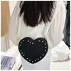 Bolso Pequeño Exquisito con Tachuelas Transfronterizo para Mujer Modelo Nuevo 2026 Bolso de Hombro con Forma de Corazón Rojo Bolso Cruzado Versátil con Cadena de Moda