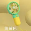 Mini ventilador de mão com design de frutas e flores de desenho animado, com base e suporte para celular, portátil para uso em mesa de escritório e de estudante