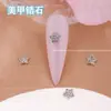 Popular en línea popular joyería para uñas chapada en oro circonita gota de agua joyería para uñas de alta gama exquisita estrella Luna diamante para uñas al por mayor