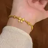Pulseira com Laço Estilo Princesa Explosão Livro Vermelho Pequeno 2025 Novo Estilo Antigo Pequenas Contas Douradas Pulseira Escovada Ouro Quebrado