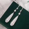 Pendientes Largos de Imitación Perla Forma de Gota de Agua, Clips para Orejas de Disco Espiral Antimosquitos, Pendientes Populares de Gama Alta para Mujer, Diseño de Nicho