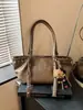 Bolsa tote retrô grande capacidade transfronteiriça para mulheres, nova coleção outono/inverno 2026, bolsa de ombro simples e fashion, adequada para o trabalho e uso diário