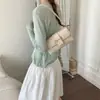Bolso Cuadrado Pequeño Minimalista de Gama Alta Verano 2026 Nuevo Bolso de Hombro Versátil Hebilla de Cinturón Retro de Nicho Bolso Cruzado de Moda