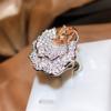 Joyería Gao Ding exquisito traje de pétalos de diamantes completos para mujer, anillo de esmeralda de imitación de circón cúbico microincrustado chapado en oro