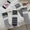 Calcetines de otoño e invierno vintage de encaje con lazo hasta la mitad de la pantorrilla para mujer, calcetines holgados a rayas y lunares estilo coreano, calcetines de algodón sin costuras para mujer al por mayor