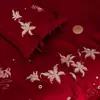 Elegante y festivo juego de cuatro piezas 100S de algodón de fibra larga en color rojo brillante para recién casados, ropa de cama de algodón puro para un matrimonio feliz