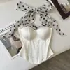 Corsé de estilo vacacional con tirantes blancos, patchwork de lunares blancos y negros, entallado a la cintura y con ballenas