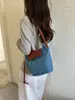 Bolso de mujer nuevo transfronterizo 2026, moderno bolso cubo de retazos para todas las estaciones con solapa, bolso de hombro y cruzado versátil casual