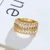 Anillo de hoja con incrustaciones de olivino popular transfronterizo nuevo europeo y americano anillo electrochapado en oro de 18 quilates anillo simple de moda