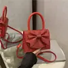 Bolsa Quadrada Pequena de Mão Pérola Estilo Doce Fresco Atacado Bolsa Feminina Outono 2025 Nova Bolsa de Ombro com Laço Bolsa Transversal