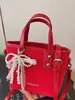 Bolso de Cubo Casual de Moda y Texturizado Nuevo Verano 2025 Elegante Simple de Nicho para Mujer Bolso de Hombro Cruzado