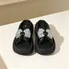 Pantuflas de Moda con una Tira para Mujer 2026 Verano Nuevo Estilo Lazo de Pedrería Versátiles Elegantes Casuales Chanclas de Playa con Suela Gruesa para Mujer