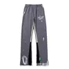 Pantalones Largos Casuales Unisex con Estampado de Letras Logo y Cordón Estilo Básico Tinta Salpicada Ropa de Pareja