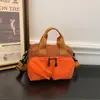 Bolsa pequena quadrada leve xadrez color block casual 2026 nova versátil multi-bolsos prática de ombro crossbody
