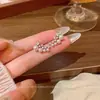 Pendientes de botón de perla y circonita estilo fila para mujer, diseño de nicho exquisito, sensación de alta gama, estilo único, pendientes nuevos