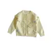 Conjunto de Duas Peças Cardigan de Tricô com Laço para Meninas 2026 Outono Novo Doce Suéter Infantil Roupa de Saia Tutu
