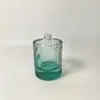 Estilo Lujo Ligero 50ml Rayas Verticales Cilíndrica Bolsa de Aire Botella Spray de Perfume Vidrio Verde Degradado Botella de Perfume Vacía Etiqueta Logotipo