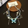 Collar de mariposa azul degradado estilo milenio, collar con diseño de subcultura femenina, cadena de nicho con borlas, cadena de clavícula, marea