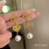 Pendientes de estilo antiguo europeo y americano Pendientes de estilo francés de lujo ligero de alta gama únicos Pendientes de diseño de nicho nuevo Pendientes retro para mujer