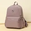 Mochila casual transfronteriza para mujer 2026 modelo nuevo de otoño bolsa de nailon simple versátil ligera mochila de moda para damas