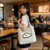 Bolso tote nuevo de patrón de letras 2026 transfronterizo, bolsa de gran capacidad para el trabajo, bolso de hombro, bolsa tejida