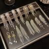 Aretes de borla de circonio de garra de alta calidad con aguja de plata 925 para mujer, temperamento de nicho de lujo ligero, aretes largos, aretes adelgazantes para rostro redondo