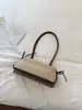 Bolso de hombro retro de nicho estilo francés para mujer, nuevo bolso de mano de alta calidad para el día a día, bolso versátil para llevar debajo del brazo