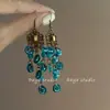 Pendientes Exóticos Vintage de Borlas Azul Lago Fluido Diseño de Nicho de Alta Gama Pendientes Bohemios para Mujer